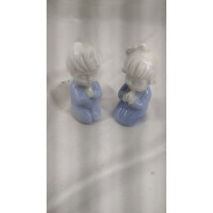 2 vintage boy and girl kneeling and praying